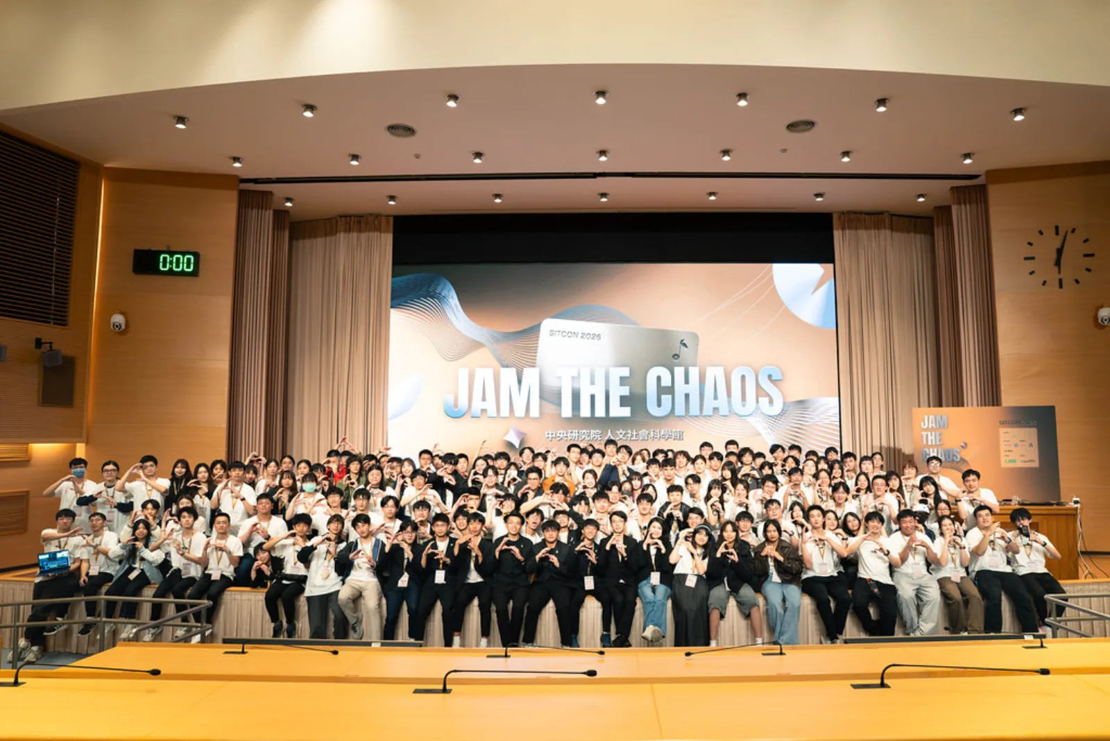 SITCON 2026 全體工作人員在國際會議廳舞台前的大合照
